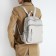 Women's backpack made of artificial leather with lightning, 6 outer pockets, beige color