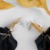 Earrings Assorted "Wind" crumpled triangles, black and golden color