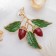 Brooch "Stoils", color brown-green in gold