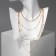 Class "chain" classic with beads, multi -tier, gold color,