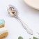 A teaspoon spoon with an engraving "graduate 2023", h = 14