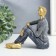 Souvenir Polystone "A young man in a gray sweater, sits" 14.5x7x14 cm