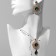 Set 2 objects: earrings, pendant "Eye", green-white color in gold, 48 cm