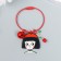 Acryl keychain on a cable with a bell "Baby in a red beret with a rose"
