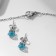 Set 2 objects: earrings, pendant pendant, blue color in silver