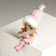 Souvenir Polystone "Baby/Baby in a pink suit, with skis" sits mix 5x6x14 cm