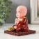 Plastic pendulum from the solar battery "Little Buddha prays" 7.3x7.3x8.8 cm