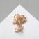 The brooch is “open” flower, white color in matte gold
