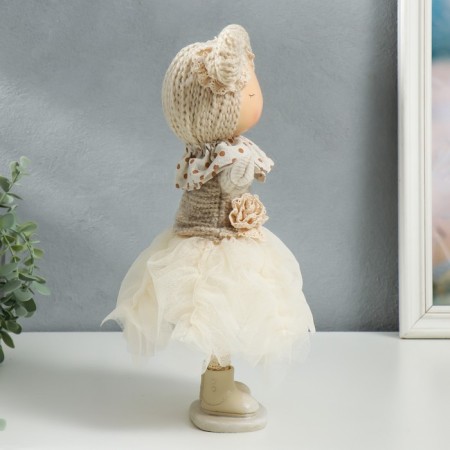 Interior doll "Baby in a beige outfit, a skirt from a mesh" 33x15x18.5 cm-1
