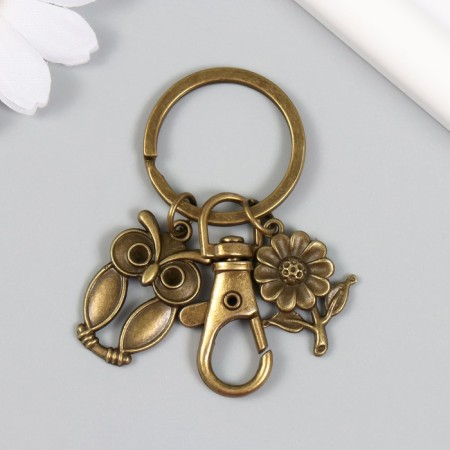 Trick Metal with carbine "Eagle and Flower" Bronze 6 cm-1