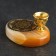 Sign of OM with a hole for incense, selenite
