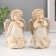 Polystone souvenir "Angel in a flower dress and a wreath with silver wings" mix 14.5 cm