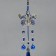 Suspension from the evil eye Metal "Butterfly with bells and brush" 7x30 cm