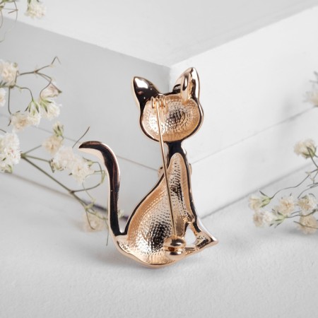 Brooch "Kitten" with a mobile bow, the color is white in gold-1
