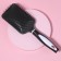 The comb is massage, wide, 8 × 25 cm, black/white color