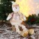 Soft toy "Snowman in sequins - long legs" sits, 13x52 cm, brown