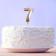 Candle for the cake, number "7", champagne.