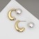 Earrings with pearls "exclus" half -rings, color gold