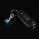 Cartage keychain, piston, metal, mother -of -pearl