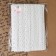 Knitted lace, 25 mm × 15 ± 1 m, white color