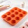 Baking uniform “Circles”, silicone, 12 cells, 33 × 25 × 2.6 cm, d = 7 cm, orange color
