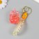 Trick rubber with carbine, strap "glass of lemonade" Water with glitter 4x6x6 cm