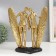 Polystone souvenir "Matter surfing" gold 26x23.5x12.5 cm