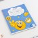 A notebook of 18 sheets A5, on the paper clip “September 1: Smiles”, 5 types of mix, whiteness 96%.