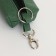 Key of zipper, length 16 cm, ring, carbine, green color