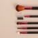 A set of makeup brushes, 5 objects, black/raspberry color