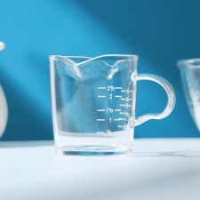 Glass mug of measured with the nose 