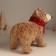 Decor "Bear in a knitted scarf with cones and berries" 12x22x19 cm