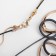 Pendant "chain" melancholy, plexus circles and ovals, black color in gold, 55 cm