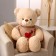 Soft toy "Bear", in a knitted jacket, 100 cm, beige color