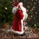 Santa Claus "in a striped fur coat, flashlight and gifts" 47 cm, white-red