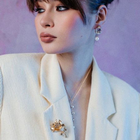 The brooch is “open” flower, white color in matte gold-4
