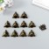 Corner Metal "Triangle" set 10 pcs+nail. bronze 1.8x1.8 cm