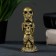 Figure "Three Skulls" aged gold, 10x4x4cm