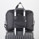 The bag is road, folding in a cosmetic bag, lightning department, outer pocket, long belt, black color