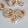 Decor for creativity plastic "Double bow with heart" set 10 pcs 4.5x3.3 cm