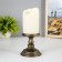 Spinker "candle on the candlestick" LED from bronze batteries 10.5x10.5x28 cm