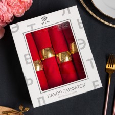 A set of napkins with a decorative. Rings 