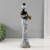 Souvenir Polystone "African in white with a golden jug and bracelets" 6x8.2x33 cm