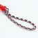 Cable toy with a bone, up to 150 g, up to 40 cm, red-white-green