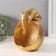 Souvenir Polystone stand "Elephant with a large stone bowl" gold 13x15x18 cm