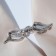 Cardigan clamp "Waves", white color in silver