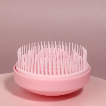 The comb is massage, round, folding, with a mirror, d = 7.5 cm, in the box, the color is pink-1