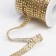 Thermoclay rhinestones, d = 4 mm, width - 12 mm, 4.5 ± 0.5 m, gold color