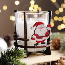 Aromatic candle in a glass on the stand 