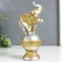 Souvenir Polystone "Elephant on a ball in the openwork blanket" 19x8.5x5.5 cm